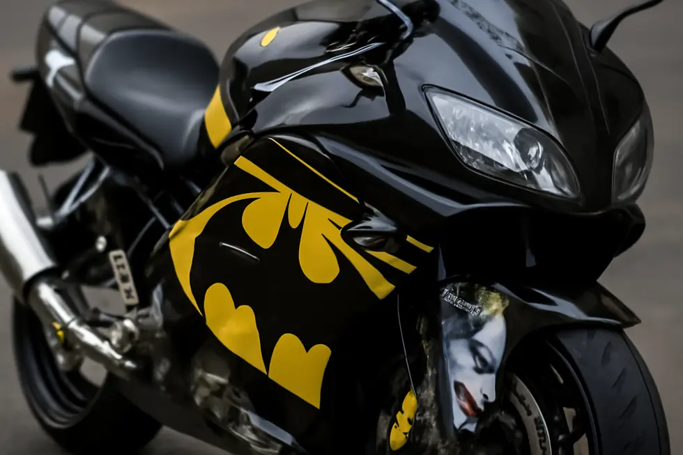 Close-up highlighting the ABS construction and the vibrant Batman & Joker design on a Honda CBR600 F4i fairing.