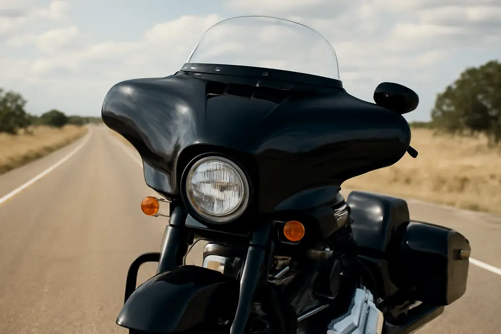A batwing motorcycle fairing illustrating its wide, wing-shaped front design and aerodynamic windshield.