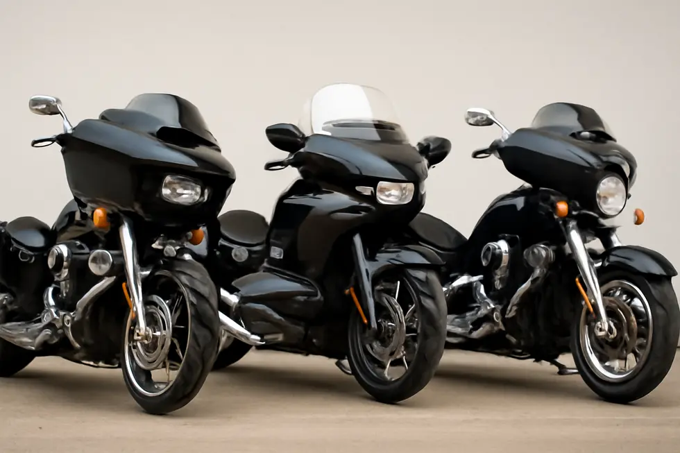 The sleek and functional design of a Reckless Dark Night Batwing fairing fitted on a Harley Road King.