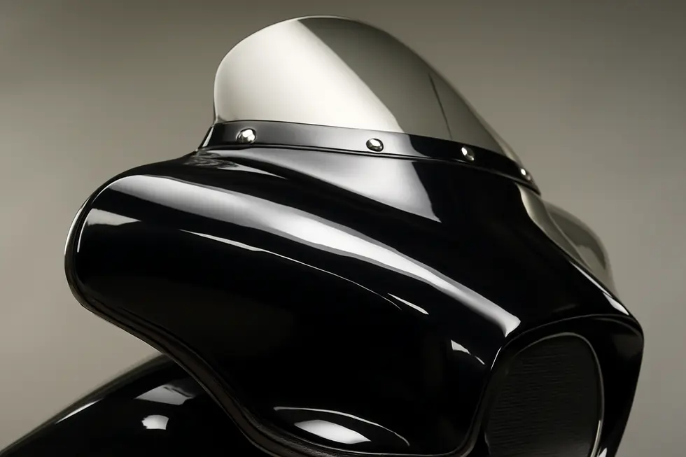 Technician installing a custom Corbin motorcycle fairing during the Ride-In service, highlighting bespoke customization.