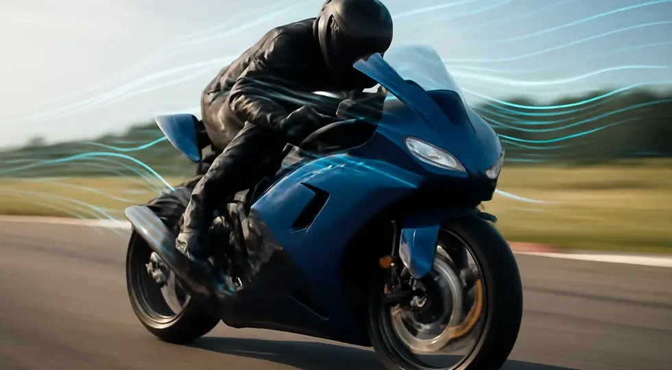 A sport motorcycle showcasing a aerodynamic full fairing in action, highlighting its impact on speed and style.