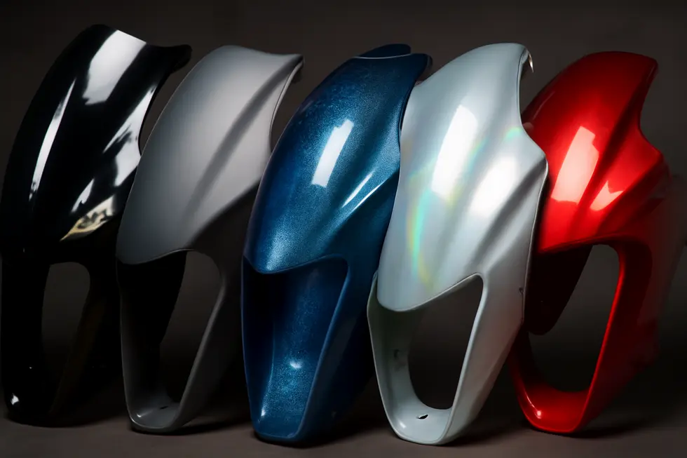 A motorcycle fairing showcasing vibrant, UV-resistant paint that maintains durability under intense sunlight.
