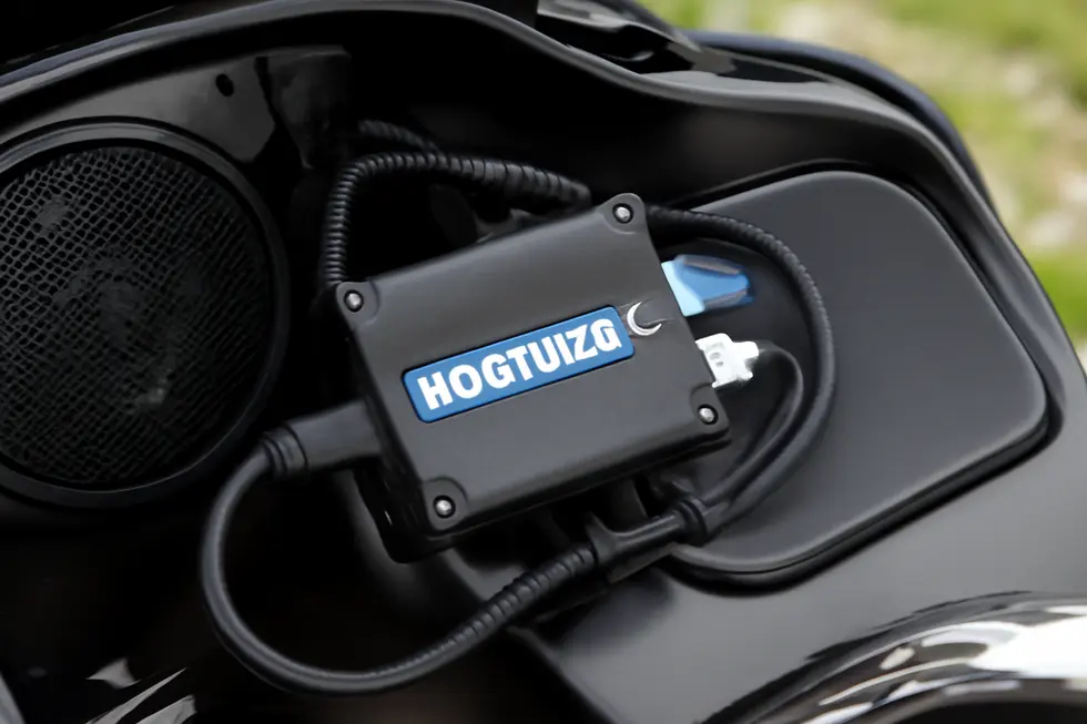 Custom Hertz amplifier securely installed inside a 2024 Road Glide motorcycle fairing, demonstrating clean wiring and tailored fitment.