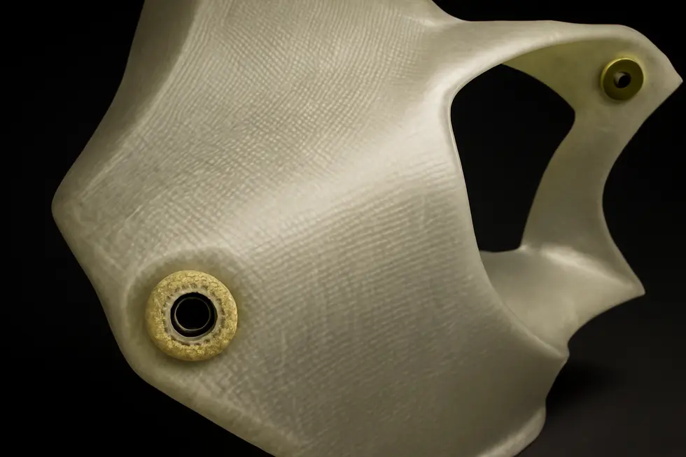 Detailed view of Hotbodies fairing materials highlighting fiberglass and Kevlar reinforcements.