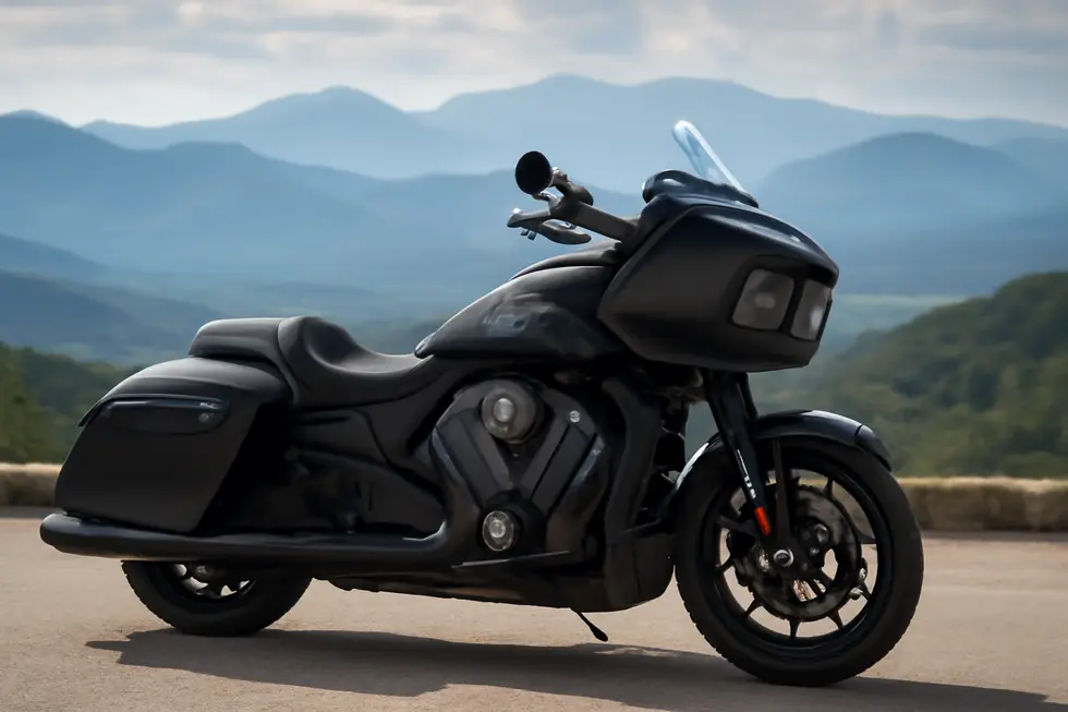 Indian motorcycle fixed fairing improving rider comfort and aerodynamic efficiency on a highway.