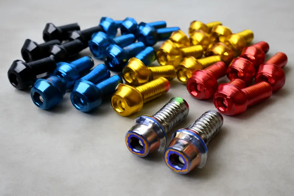 Anodized aluminum and aircraft-grade titanium bolts highlight material advancements in motorcycle fairing bolt kits.