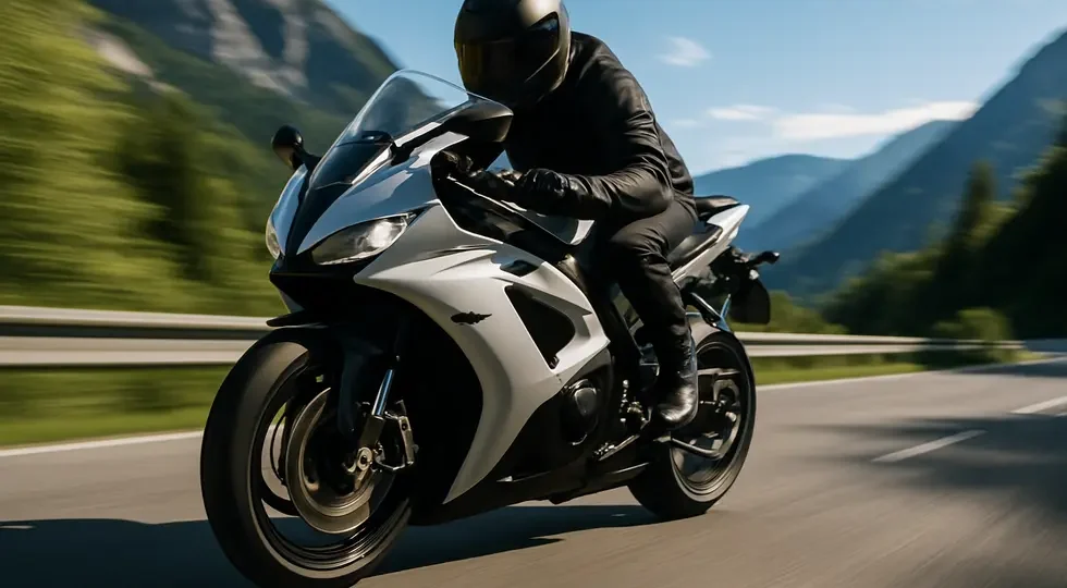 Modern sport motorcycle with full fairing cruising on a mountain road, showcasing aerodynamic design and performance.