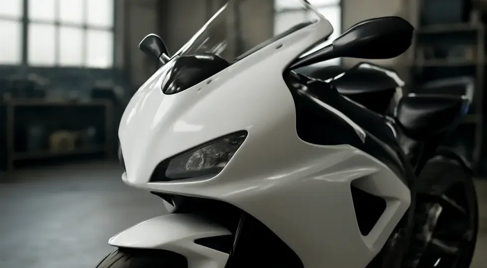 A pristine fiberglass-repaired motorcycle fairing showcasing expert restoration and finishing work.