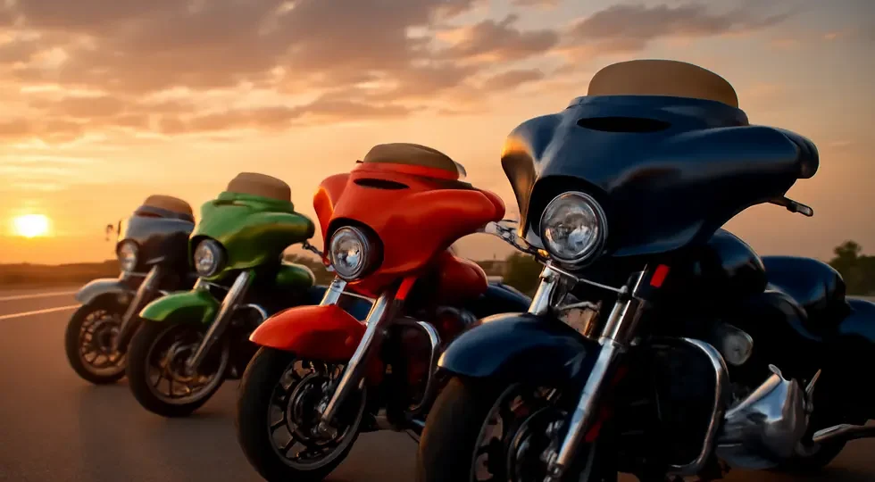 Custom Harley-Davidson motorcycles with batwing fairings lined up at sunset, symbolizing style and touring culture.