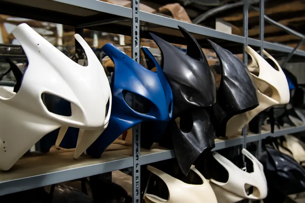Precise cleaning and sanding of a motorcycle fairing ready the surface for effective fiberglass repair.