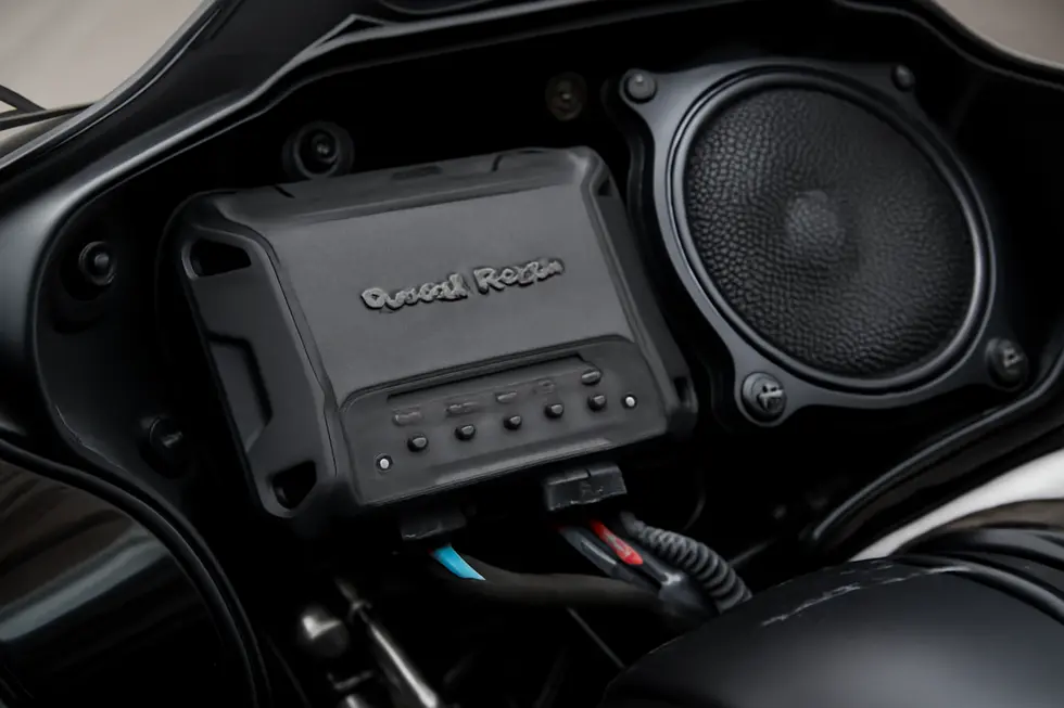 Custom Hertz amplifier securely installed inside a 2024 Road Glide motorcycle fairing, demonstrating clean wiring and tailored fitment.