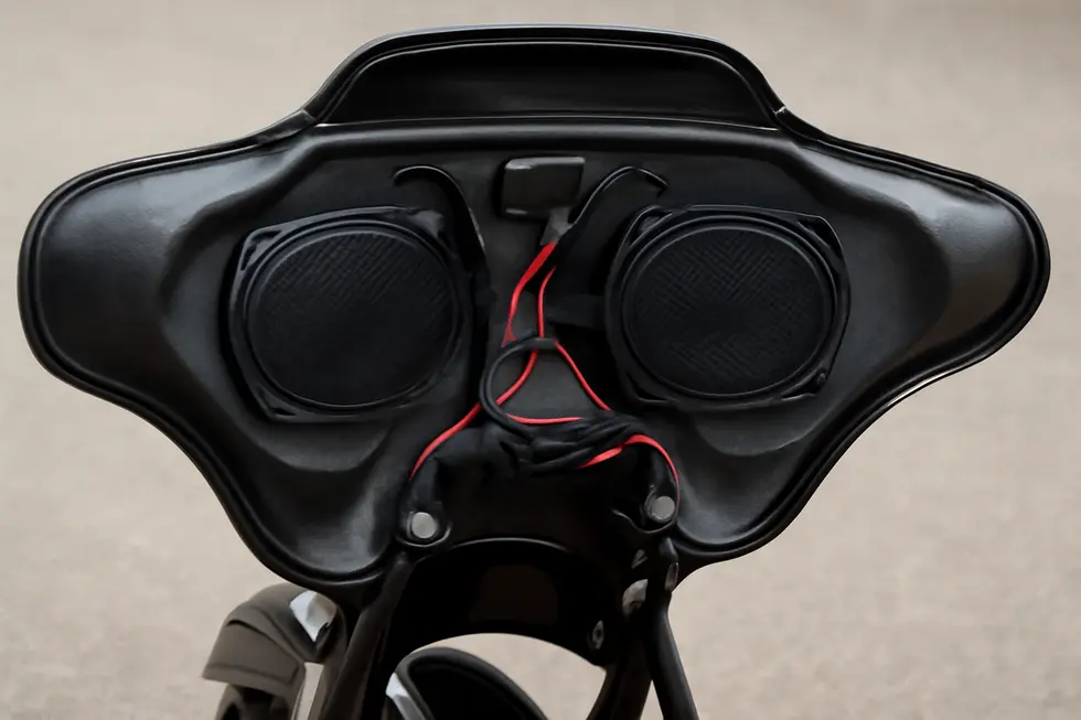 Tsukayu’s Batwing 6×9 fairing displayed on a motorcycle, highlighting its stylish design with integrated audio speakers.