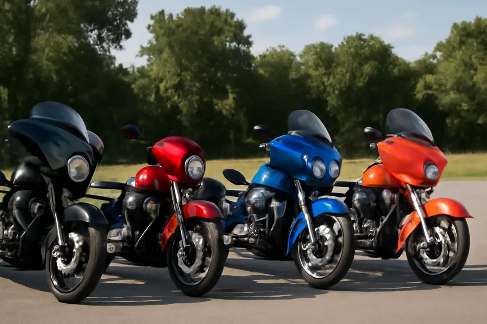 A photo illustrating the aerodynamic design features of a motorcycle fairing in a detailed workshop environment.
