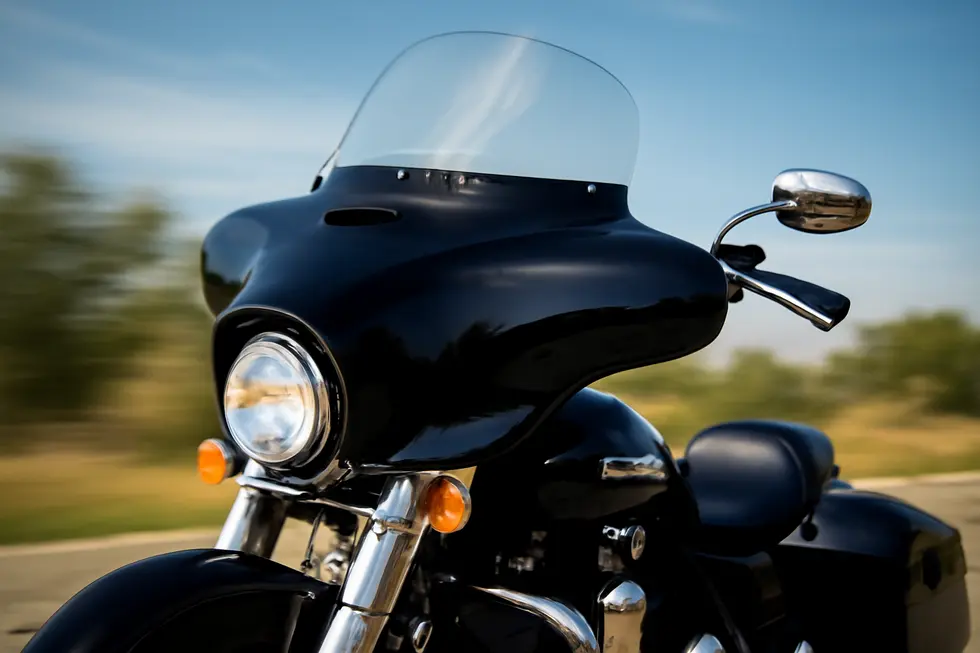 Cruiser motorcycle showcasing the iconic batwing fairing designed for optimal wind deflection and rider comfort.