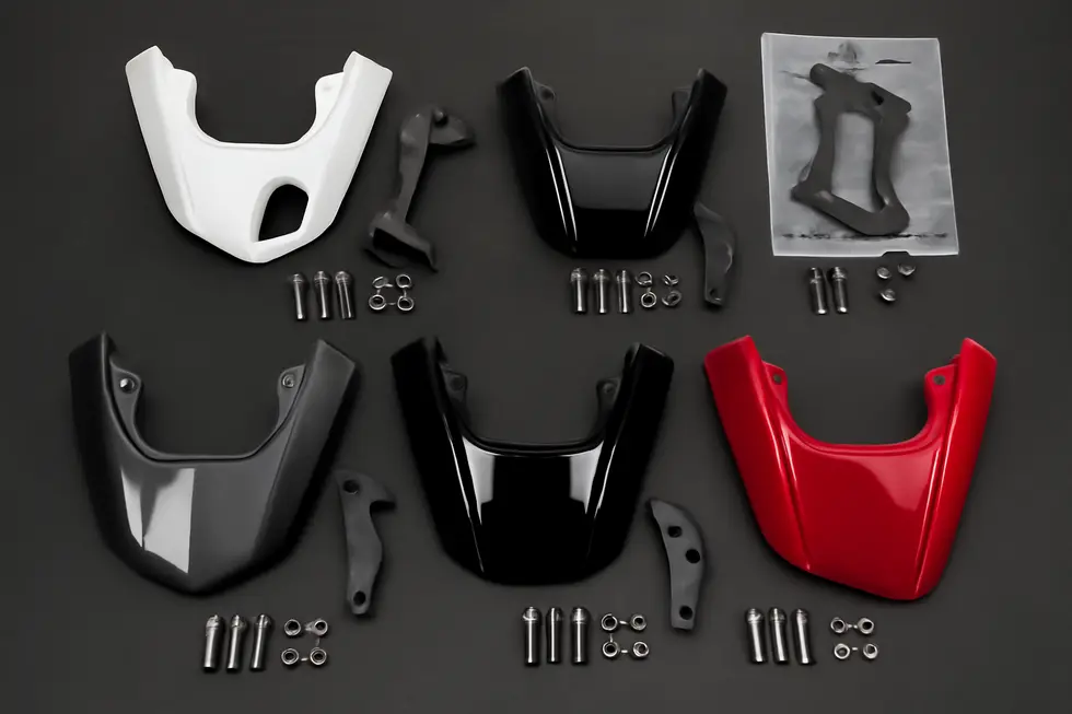 Urethane chin fairing installed with bolt-on hardware on a motorcycle’s front lower fairing.