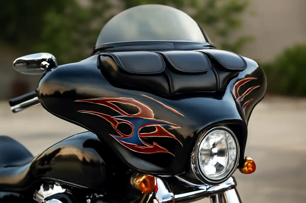 Intricate custom 3D skull and crossbones decals on a Harley-Davidson batwing fairing highlighting design versatility.