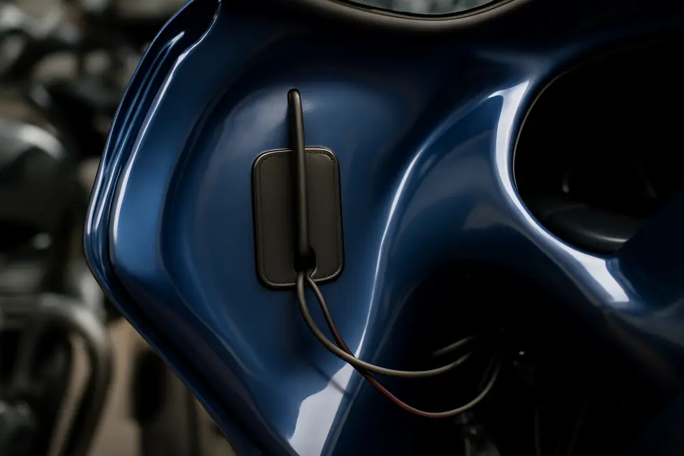 A hidden motorcycle fairing antenna integrated seamlessly inside the fairing panel for stealthy communication enhancement.