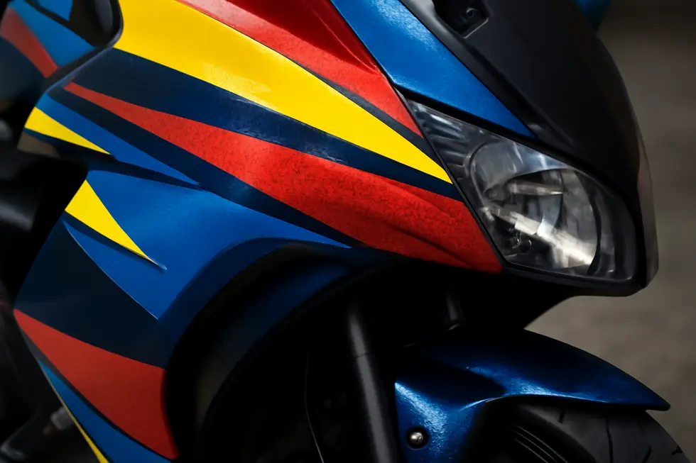 Close-up of a motorcycle fairing wrap demonstrating the variety of finishes and durability.