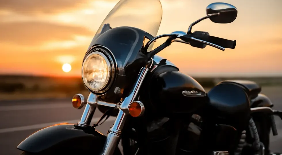 A cruiser motorcycle featuring an aerodynamic bullet fairing, enhancing style and rider comfort in a scenic highway setting.