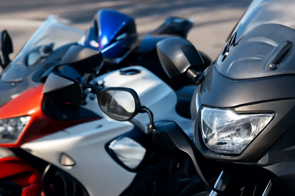 Comparing different types of motorcycle fairing mirrors, illustrating key features and mounting styles.