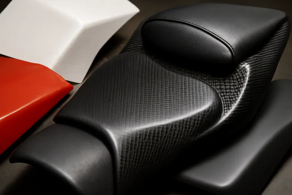 A high-performance motorcycle featuring an aerodynamic seat fairing that enhances both style and functionality.