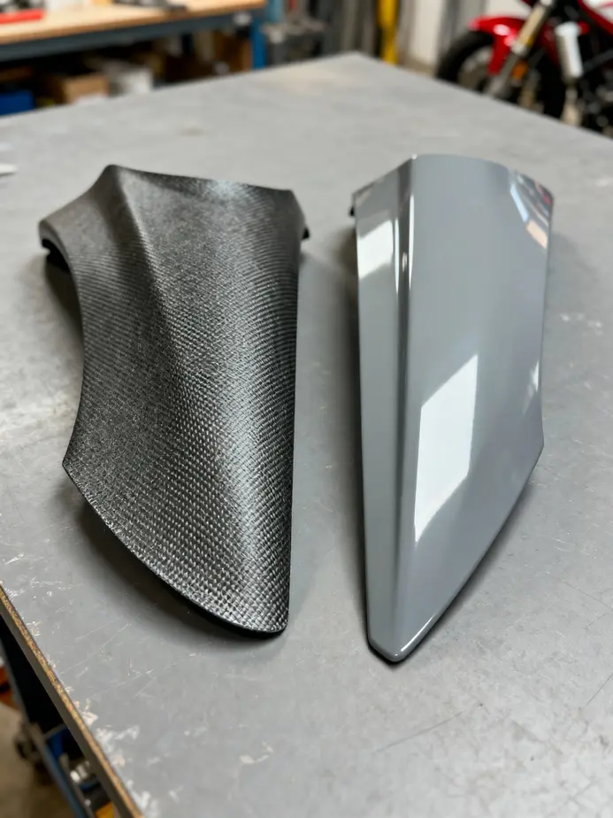 Comparing fiberglass and ABS plastic fairings to ensure accurate identification for effective repairs.