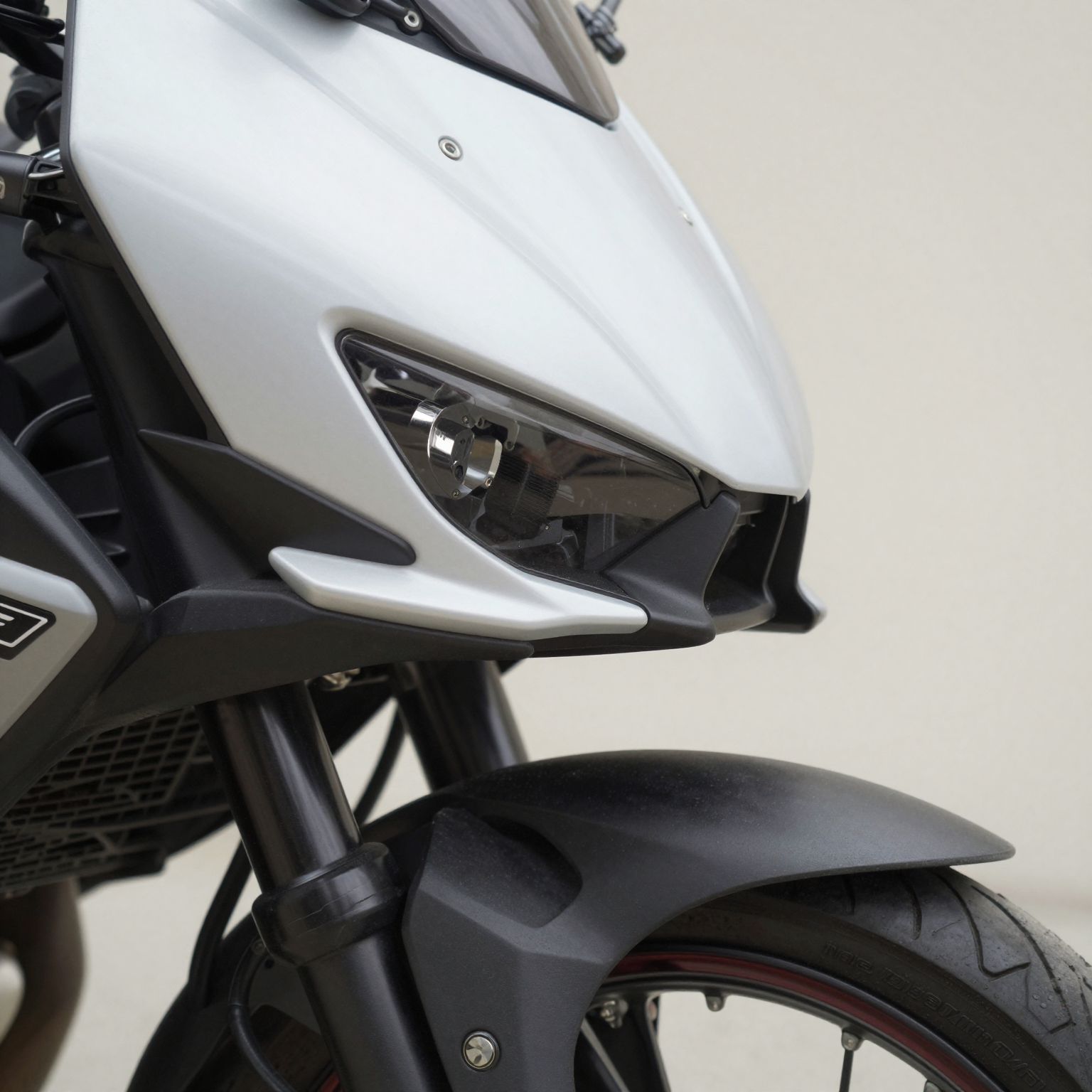Close-up of Yamaha Bolt front fairing mounting bracket system showing solid bracket construction and easy installation design